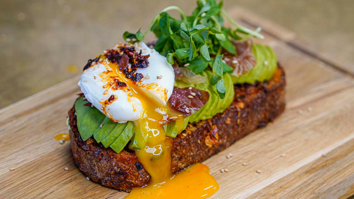 Fried sourdough bread with avocado & poached egg