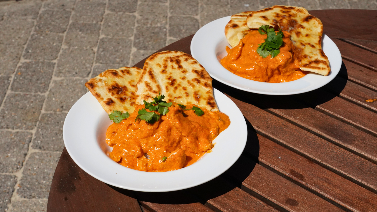 Butter Chicken in cast iron on grill