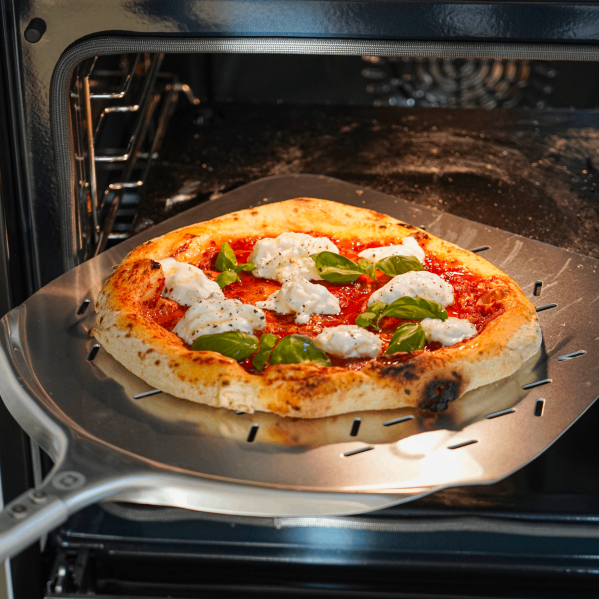 Hvorfor bliver pizza blød i midten?